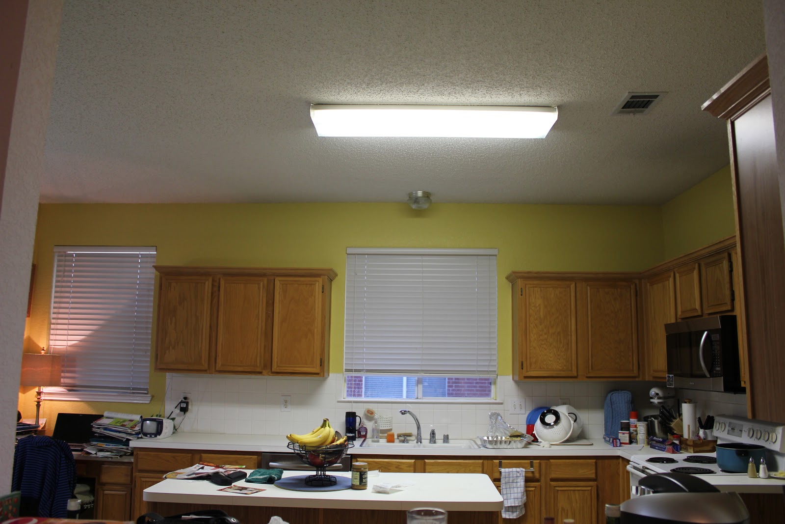 fluorescent pendant lighting for a high kitchen
