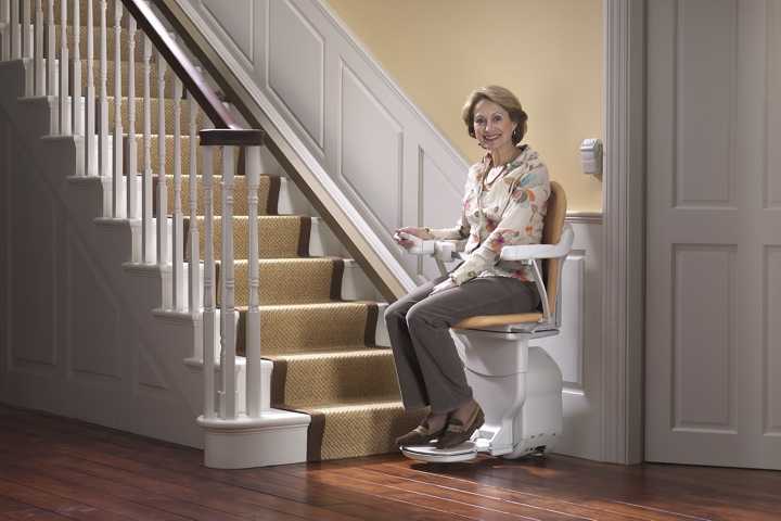 stair lift fixed to a straight staircase