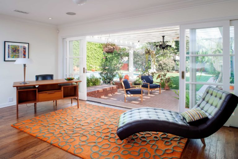 living room with sliding windows